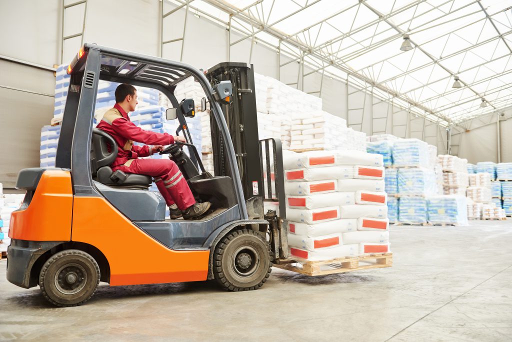 Forklift in warehouse lower res.1 forklift bespoke programming for warehousing