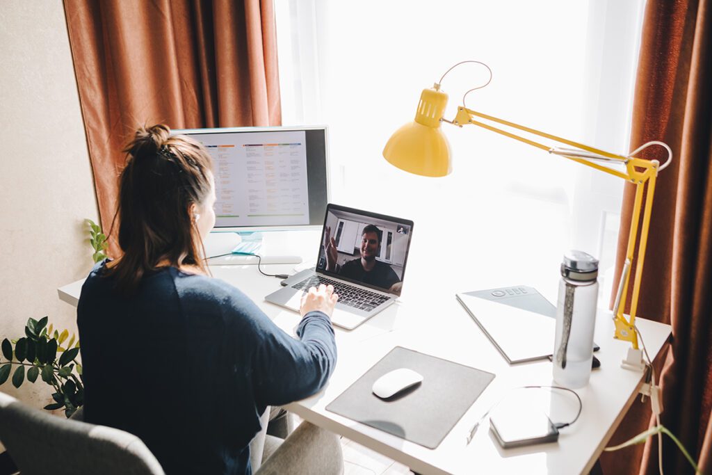 Man,And,Woman,Have,Conversation,Online.,Home,Office.,Telework. WFH, tips for working from home, hybrid working