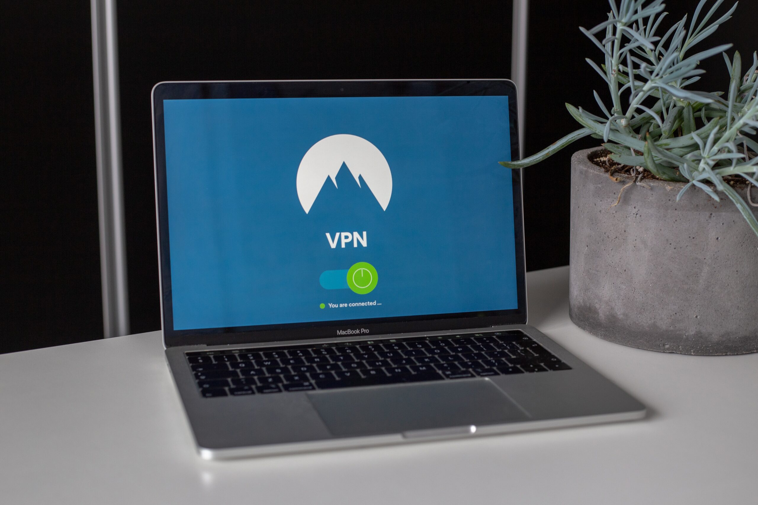 Laptop placed on desk with VPN screensaver